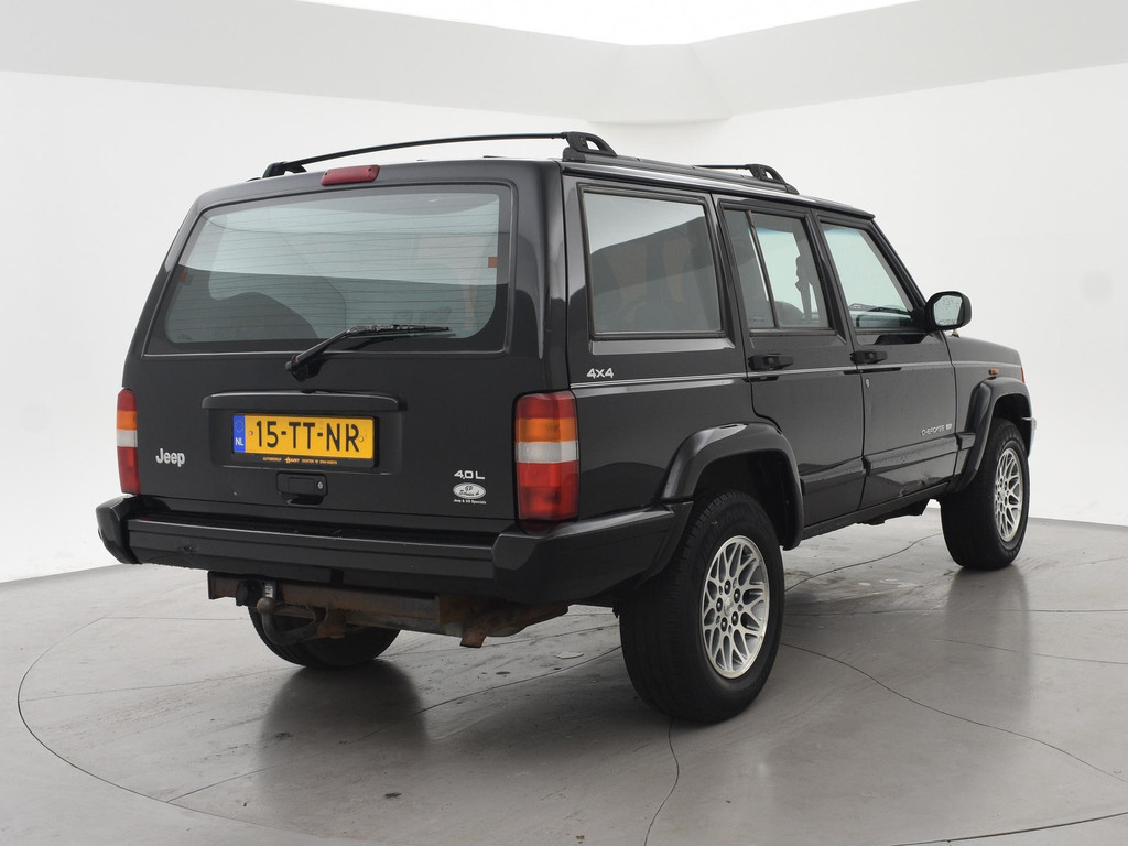 Jeep Cherokee 4.0i LPG-G3 4X4 AUT. LIMITED 36910922-0.jpg | Autobedrijf Hazet