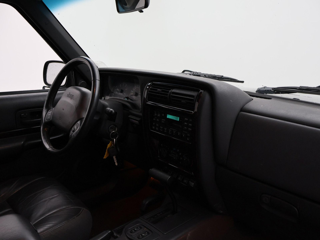 Jeep Cherokee 4.0i LPG-G3 4X4 AUT. LIMITED 36910922-0.jpg | Autobedrijf Hazet